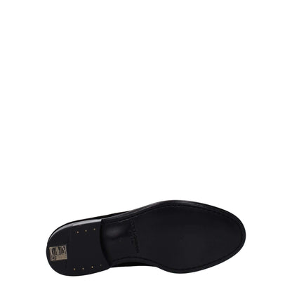 Sole view of Dolce & Gabbana Black Velvet Slip-On Loafers showcasing leather construction and round toe.