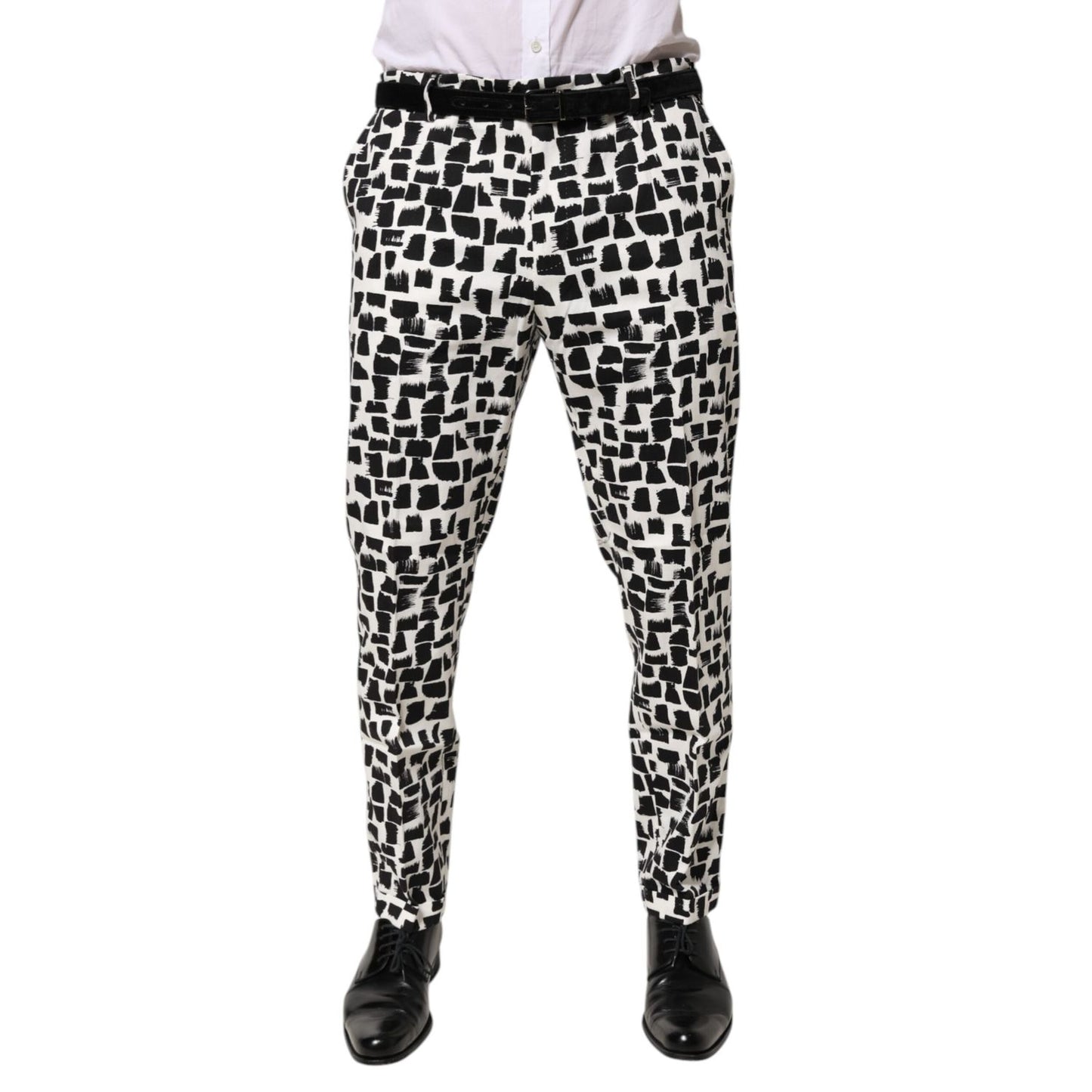Dolce & Gabbana Black White Abstract Print Cotton Blend Pants with an artistic brushstroke pattern, tailored fit displayed front view.