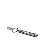 Dolce & Gabbana Black White DG Rubber Logo Silver Men's Holder Keyring with metal hardware and DG engraved logo.