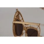 Close-up of Dolce & Gabbana DG2159B Beige Gold Straw Butterfly Crystals Sunglasses showing side detail.