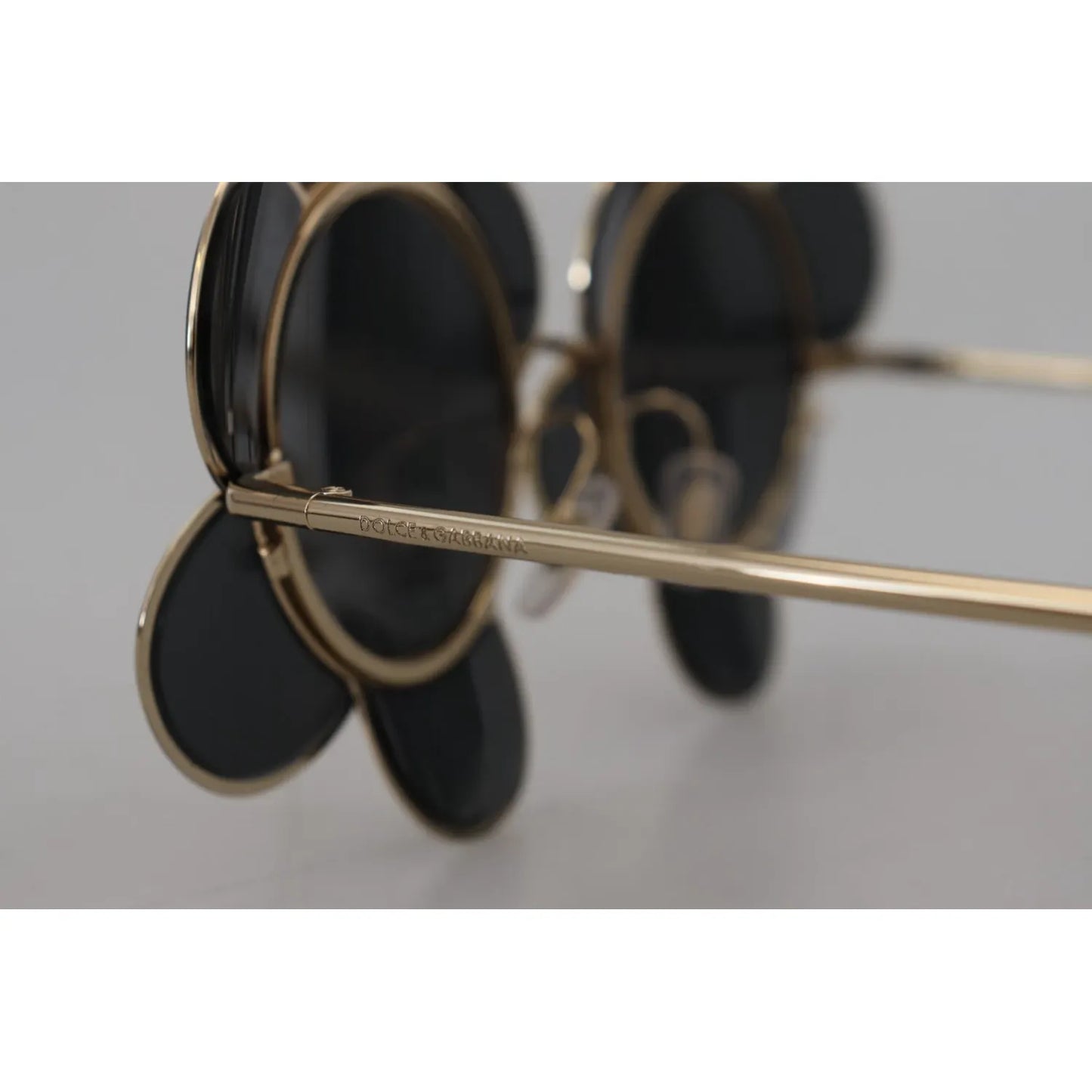 Dolce & Gabbana DG2201 Black Lens Gold Frame LIMITED EDITION Sunglasses side view showing metal frame detailing.