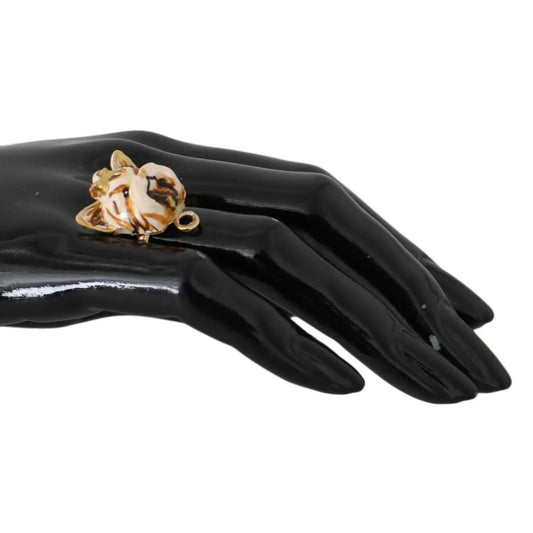 Dolce & Gabbana Gold Brass Resin Beige Dog Pet Accessory Ring on display against a black background.
