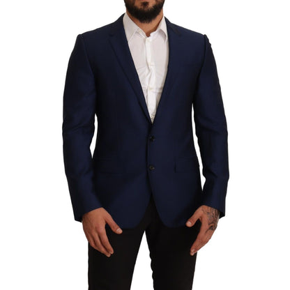 Man wearing Dolce & Gabbana Navy Blue Slim Fit Jacket MARTINI Blazer with notch lapel and two-button style.