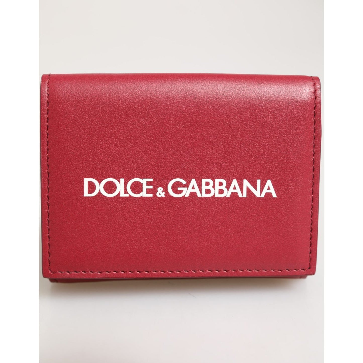 Dolce & Gabbana Red Leather Bold Logo Print Trifold Card Holder Wallet front view with white logo.