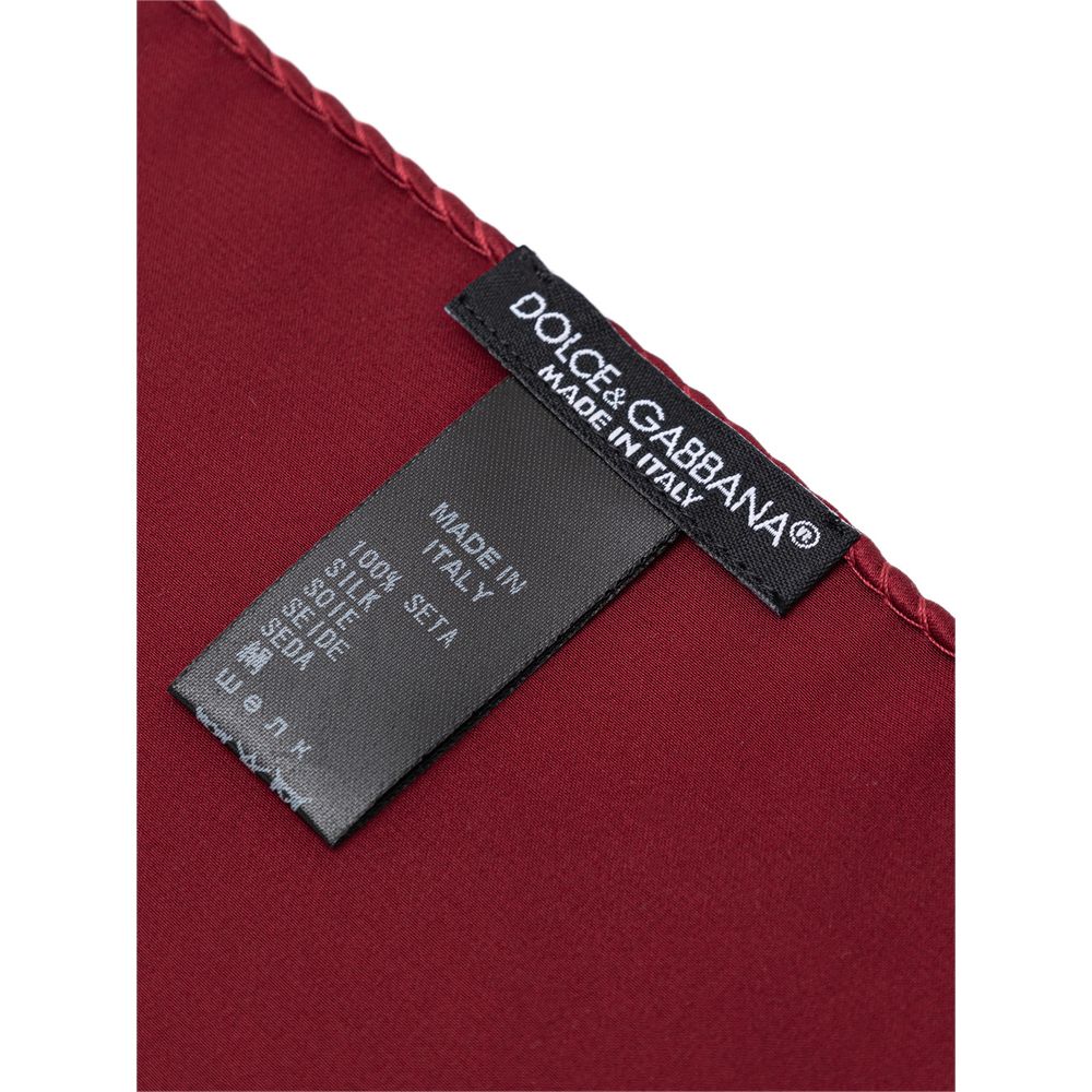 Dolce & Gabbana Red Silk Pocket Square showing brand label and 100% silk composition.