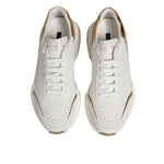 Dolce & Gabbana White Gold Daymaster Low Top Sneakers Shoes featuring white leather with gold accents and rubber sole.