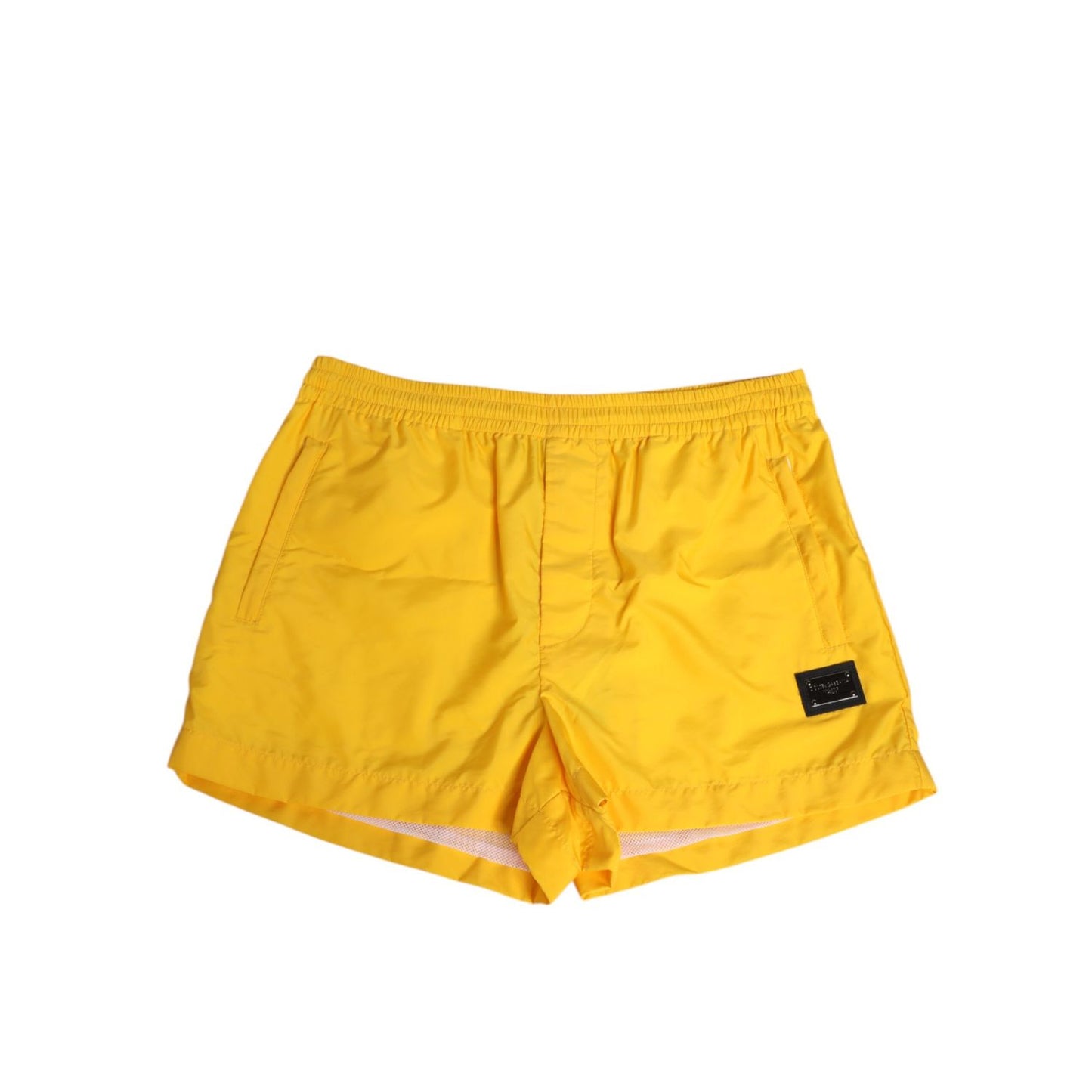 Dolce & Gabbana Yellow Nylon Logo Plaque Boxer Shorts Swimwear with elasticated waistband for stylish summer beach days.