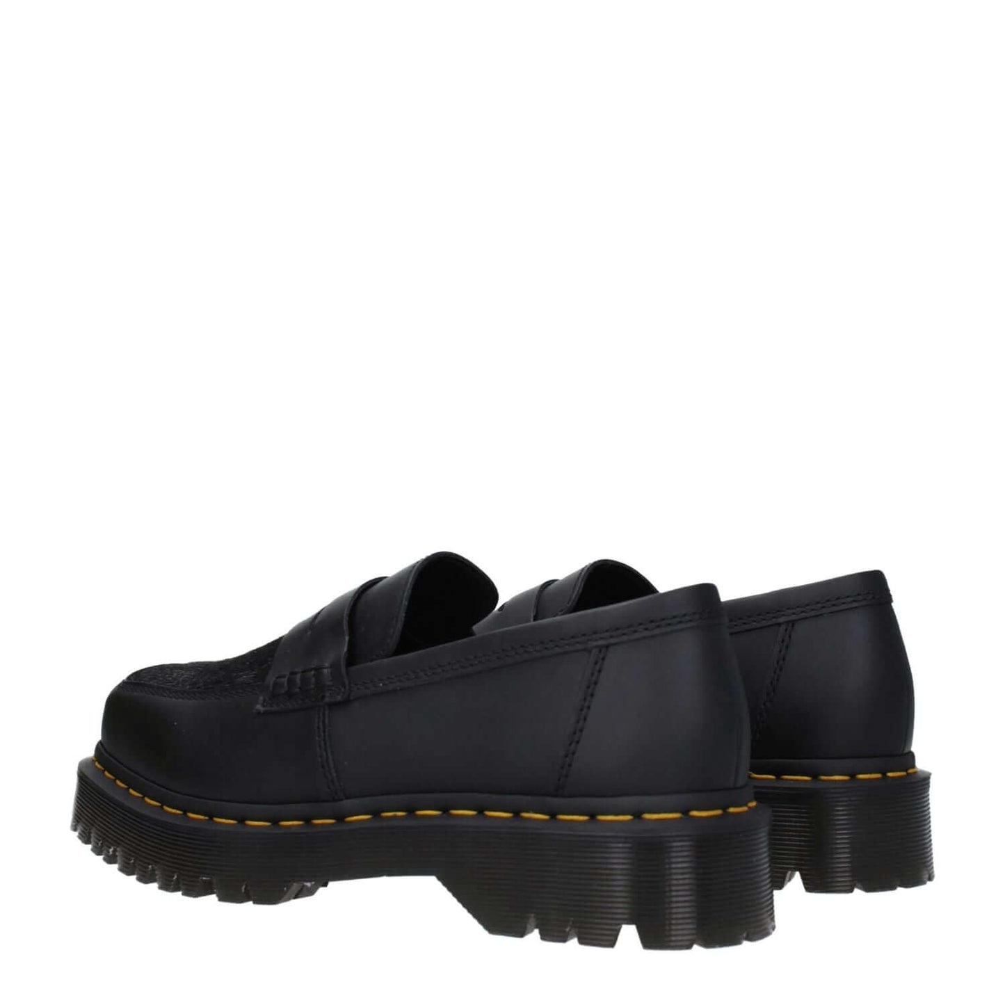 Dr. Martens Black Leather Slip-On Loafers with rubber sole and square toe, casual mid heels, showcasing side and back view.
