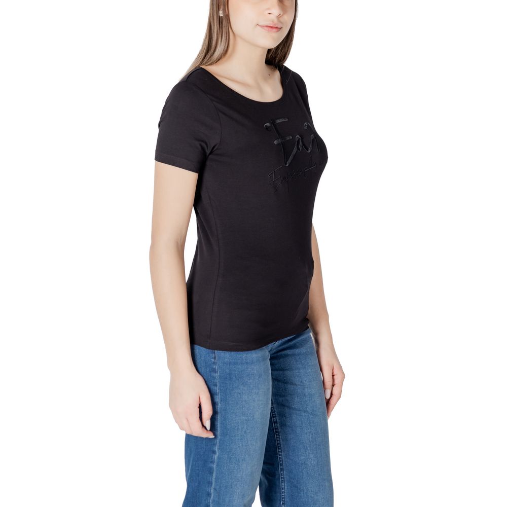 Woman wearing EA7 Emporio Armani Black Cotton T-Shirt with jeans, showcasing versatile style and comfort.