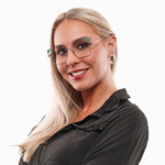 Smiling woman wearing stylish eyeglasses, blonde hair, black blouse, isolated on white background.