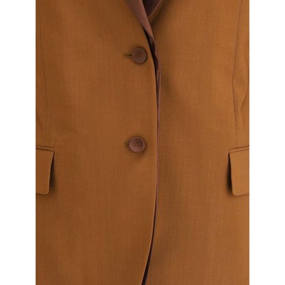 Close-up of Fendi Brown Wool Blazer with satin lapels, single-breasted button closure, and front flap pockets.