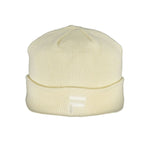 Cream beanie with embroidered logo, similar to Fila White Polyester Hats & Cap, featuring a subtle design.