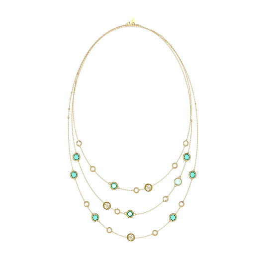 Elegant layered necklace from GUESS JEWELS JEWELRY Mod. JUBN05090JWYGAQT-U with turquoise accents on a gold chain.