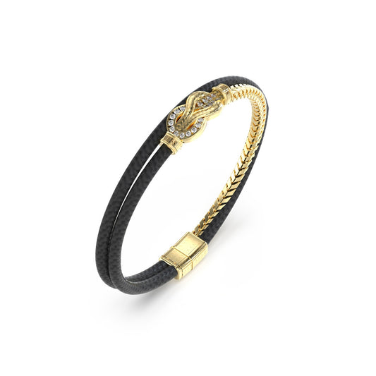 GUESS JEWELS JEWELRY Mod. JUMB05029JWYGBKS black and gold bracelet with decorative accents