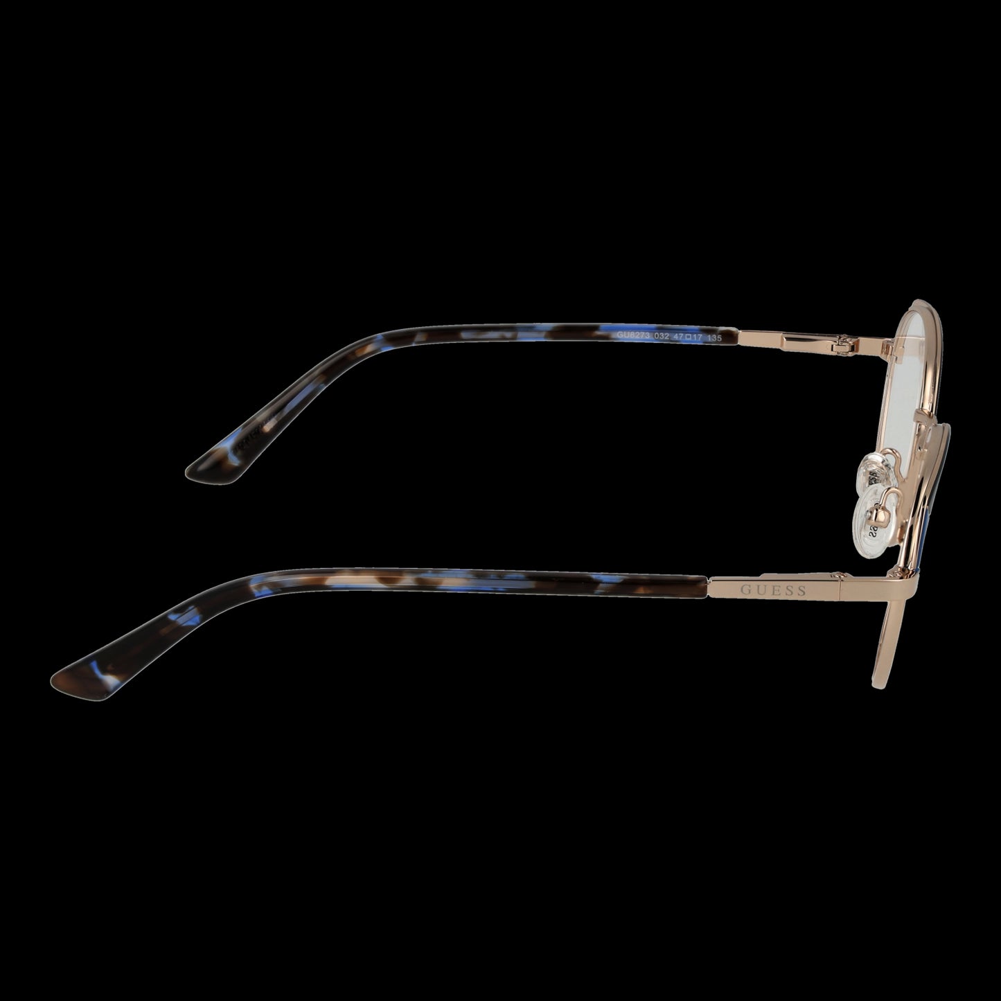 Side view of GUESS MOD. GU8273 47032 eyeglasses featuring tortoiseshell arms and gold details on a black background.