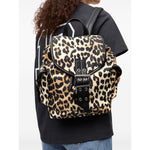 Ganni Leopard Small Nylon Bucky Backpack with foldover top and buckle fastening worn by model.