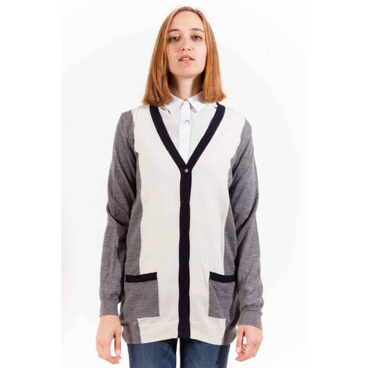 Woman wearing Gant Gray Wool Sweater, long sleeve cardigan with buttons and 2 pockets, featuring logo design.