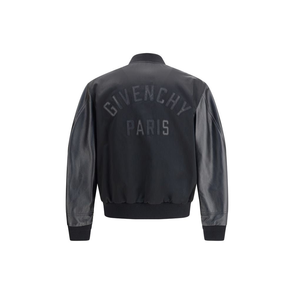 Back view of Givenchy Black Cotton Bomber with leather sleeves and GIVENCHY Paris logo applique.