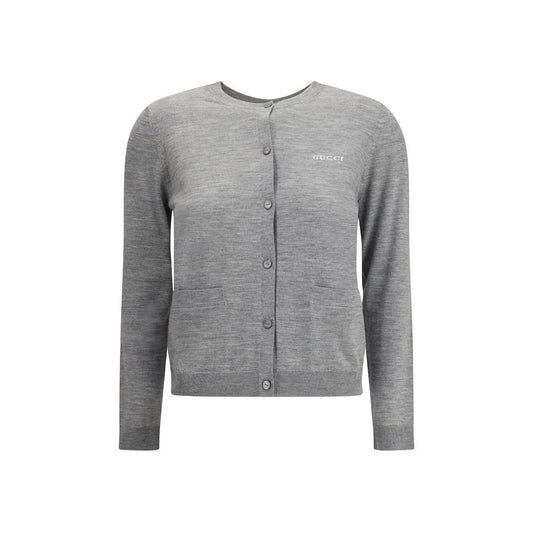 Front view of Gucci Gray Cashmere Cardigan with ribbed crew neck, button closure, and patch pockets, featuring iconic stitched logo.