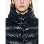 Herno Coats Blue quilted funnel neck with press-stud fastening and high-shine finish, featuring long sleeves and handwarmer pockets.