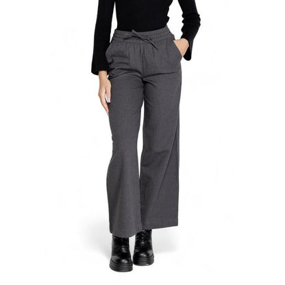 Woman wearing Jacqueline De Yong Gray Cotton Casual Pants with high waist and drawstring, showcasing palazzo style and comfort.