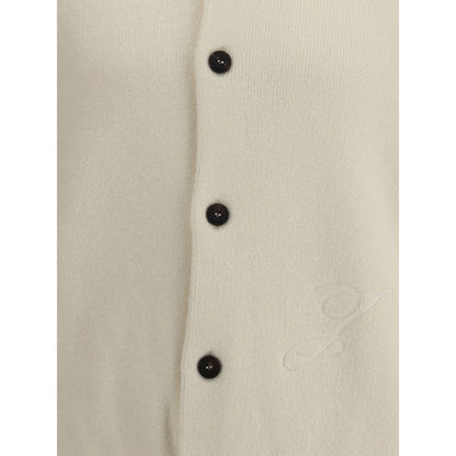 Close-up of Jacquemus White Fleece Wool Cardigan featuring black buttons and embroidered detail on the right.
