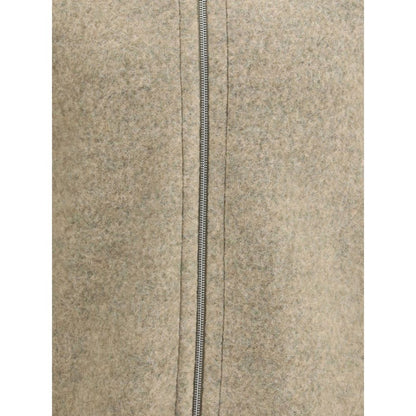 Close-up of Jil Sander Beige Wool Coat showing front zipper detail and soft texture for a modern, minimalist style.