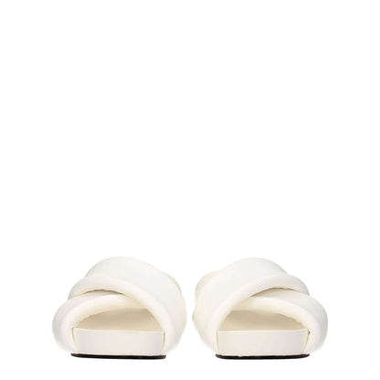 Jil Sander White Leather Slippers with vintage effect, open toe design, mid heels, and leather sole, featuring casual style.