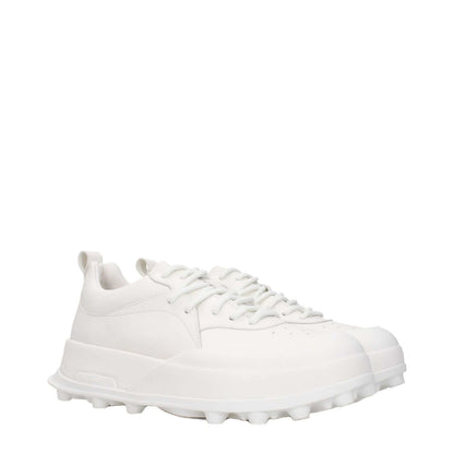 Jil Sander White Leather Sneakers with lace-up closure, mid heels, rubber sole, and side logo, sporty glam style.
