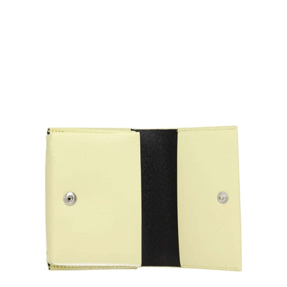 Open Jil Sander Yellow Leather Cardholder with button closure and black interior, showcasing three card slots. Casual style.