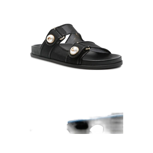 Jimmy Choo Fayence Sandal Low leather sandals with pearls, black patent leather with faux pearl embellishments and gold-tone hardware.