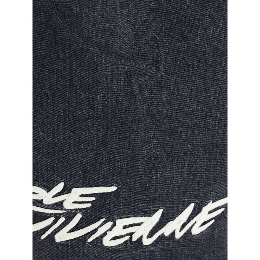 Close-up of Kenzo Black Denim Shirt with Futura 2000 graffiti pattern, showcasing detailed craftsmanship and unique design.