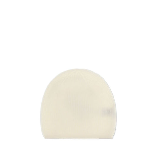 Loulou De Saison Cream Cashmere Beanie with ribbed texture, offering warmth and style for casual and sophisticated looks.