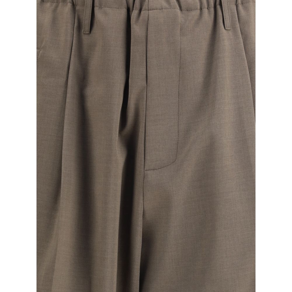 Close-up of Magliano Brown Polyester Casual Pants, showcasing elastic waistband and pocket details in a relaxed, contemporary style.