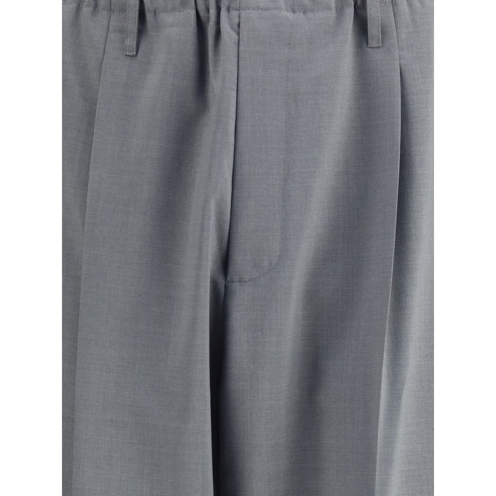 Close-up of Magliano Gray Polyester Casual Pants featuring an elasticized waistband and contemporary baggy-cut hem.