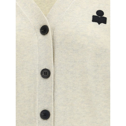 Close-up of Marant Etoile White Cotton Cardigan with front button closure and logo, showing V-neckline and texture.