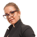 Woman wearing Marciano by Guess Purple Women Glasses Frame, cat eye style, purple acetate full-rim design.