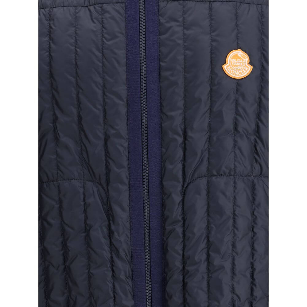 Moncler x Donald Glover Blue Polyamide Sleeveless Jacket with quilted design and front zip featuring orange logo patch.