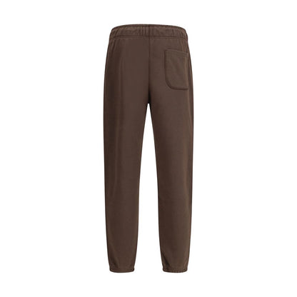 New Balance Brown Cotton Joggers (Workout Pants) with elastic waistband and side pockets, featuring logo patch for sporty style.