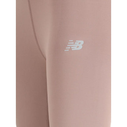 Close-up of New Balance Multicolor Recycled Polyester Leggings showcasing NB logo and high-quality fabric.