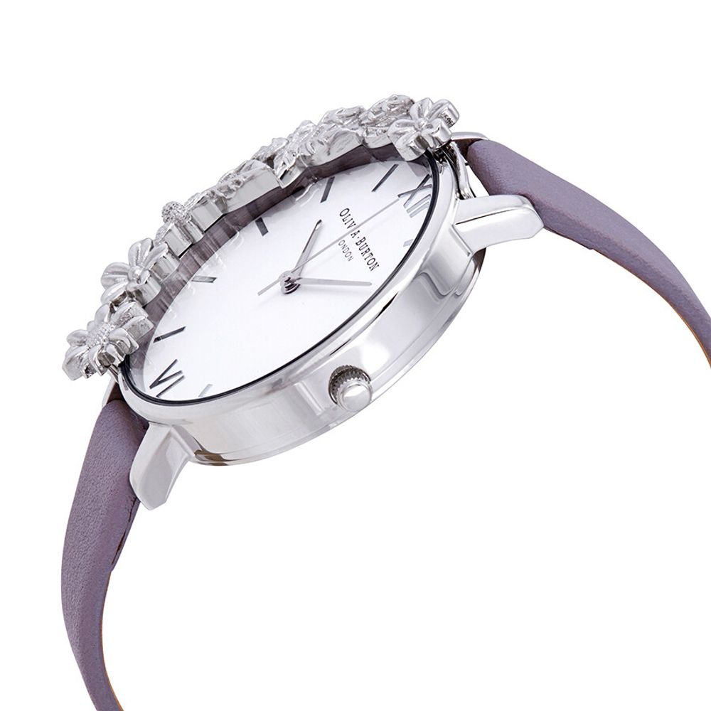 Olivia Burton Purple Artificial Leather Dress Watch with floral box design, stainless steel case, and violet synthetic leather strap.