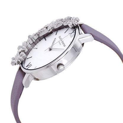 Olivia Burton Purple Artificial Leather Dress Watch with floral box design, stainless steel case, and violet synthetic leather strap.