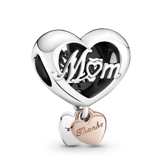 Heart-shaped PANDORA Mod. 789372C00 charm in Silver 925° for ladies, featuring 'Mom' engraving, made in Thailand, packaged in official box.