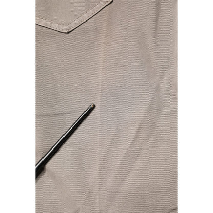 Close-up of PT Torino Brown Bull Denim Reggae Mastice Straight Trouser Jeans fabric, featuring detailed stitching and brown color.