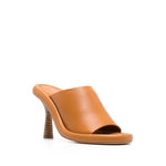 Paloma Barceló Paloma Barcelò Sandals Yellow, ochre leather, open-toe with high sculpted heel, slip-on style.