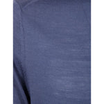 Paul Smith Sweaters Clear Blue merino wool close-up showing petrol blue knit texture with ribbed detailing.