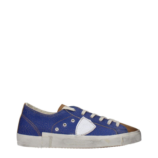 Philippe Model Blue Leather Low Top Sneakers with vintage and aged effects, featuring white logo, round toe, and lace-up closure.