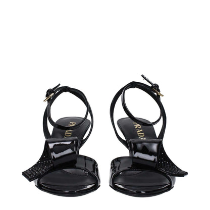 Prada Black Leather Stiletto Heel Sandals with buckle closure and open toe design, featuring mid heels and elegant side detail.