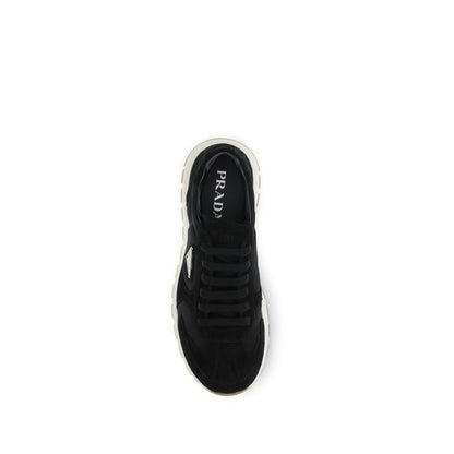 Top view of Prada Black Recycled Polyamide Athletic Sneakers with logo on tongue and innovative design.