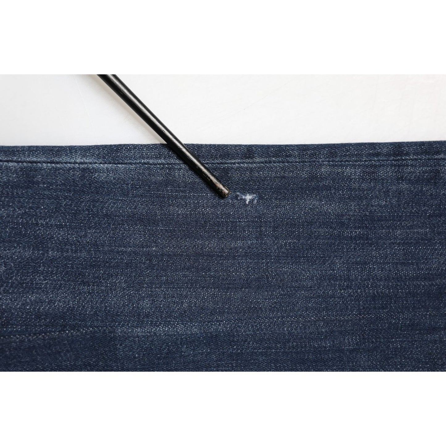 Close-up of fabric detail on Prada Dark Blue Mid Waist Skinny Fit Men Denim Trouser Jeans.